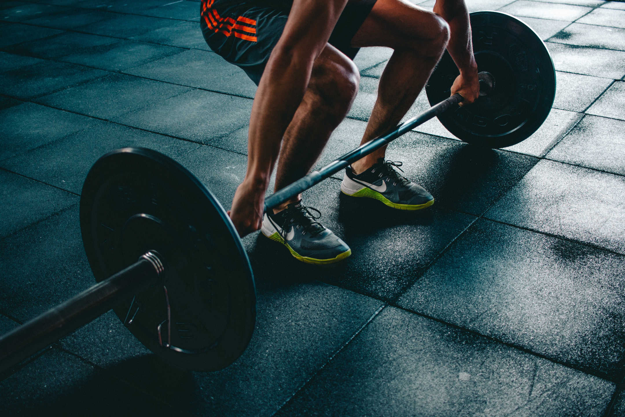 Person Lifting Dumbell